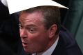 Leader of the House Christopher Pyne raises a point of order with the Speaker during a divison at Parliament House in ...