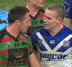 Up close and personal: Sam Burgess and Tim Browne rekindle an old feud on Friday night.