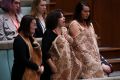 A Wiradjuri member sings from the public gallery to welcome Linda Burney member for Barton as she delivers her first ...