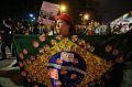 A supporter of former President Dilma Rousseff holds a Brazilian flag during a protest.