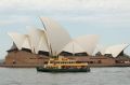 A ferry sails past the Sydney Opera House in Sydney, Australia, on Friday, April 29, 2016. Australia?s drive to balance ...