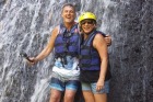 Roy and Tina Myers under a waterfall in Bali.