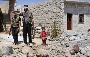 File - A Syrian child stands next to rebel fighters checking a house that was damaged in bombing by government forces in Marea, on the outskirts of Aleppo, Syria, Tuesday, Sept. 4, 2012.