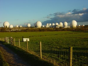 File - Radomes at RAF Menwith Hill, Yorkshire. RAF Menwith Hill, a large ECHELON site in the United Kingdom, and part of the UK-USA Security Agreement.