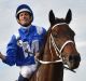 MELBOURNE, AUSTRALIA - OCTOBER 24:  Hugh Bowman riding Winx after winning Race 9, the William Hill Cox Plate during Cox ...