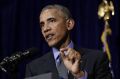 Barack Obama speaks during a news conference in Vientiane, Laos.