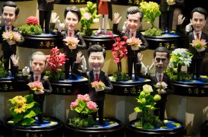 IN this Sept. 1, 2016 photo, clay figures, from bottom right, showing U.S. President Barack Obama, Chinese President Xi ...