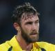 Australia's Glenn Maxwell celebrates scoring a century against Sri Lanka during their first Twenty20 cricket match in ...