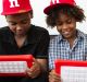 Rob Peete and Roman Peete display nabi, the tablet for children by Fuhu.