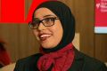 From next year Westpac bank teller Manija Akbari will wear a new corporate hijab to work.