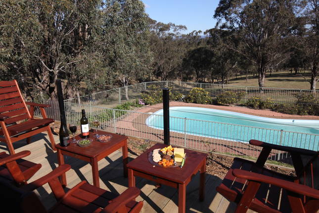 relaxing by the pool, overlooking the valley