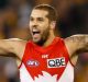 Career best form: Lance Franklin celebrates a goal with Luke Parker.