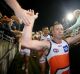 BRISBANE, AUSTRALIA - JULY 17: Steve Johnson of the Giants celebrates winning the round 17 AFL match between the ...