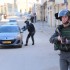 Israeli soldier threatens to open fire on innocent Palestinian driver whilst soldiers continue to target the school children