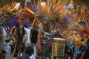 A line of protesters against the construction of the Dakota Access oil pipeline on the Standing Rock Reservation in North Dakota head to a unity rally on the west steps of the State Capitol late Thursday, Sept. 8, 2016, in Denver. Several hundred marchers walked from the four directions of the compass to the Capitol to take part in the rally against the oil pipeline. (AP Photo/David Zalubowski)