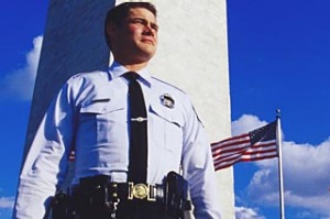 Washington DC, USA. Security guard at Washington Monument.