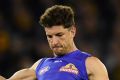 Back in the side: Tom Liberatore.