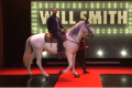 The actor rode onto the <i>Tonight Show</i> set on a horse dressed as a unicorn.