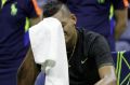 Emotional: Kyrgios appears to cry between games before his injury retirement.