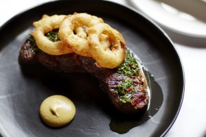 Steak and onion rings at French Saloon.