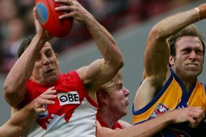 The mark: Leo Barry takes a crucial mark in the dying seconds of the 2005 grand final. 