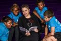 Deborah Cheetham with students Naomi Felton, Rianna Hogan, Dean Bonney and Gary Tucker celebrate Indigenous Literacy Day ...