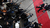 European Commission President Jose Manuel Barroso (R) waves upon his arrival at a two-day European Union leaders summit in Brussels October 29, 2009. REUTERS/Francois Lenoir (BELGIUM POLITICS) - RTXQ511