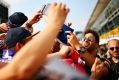 Adopted local: Daniel Ricciardo signs autographs for fans during previews for the Formula One Grand Prix of Italy at ...