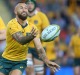 Bouncing back: Quade Cooper passes the ball against South Africa.