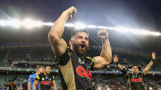 Panthers winger Josh Mansour celebrates beating Canterbury at Allianz Stadium on Sunday.