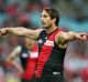 Essendon captain Jobe Watson signals to his teammates during the match against Sydney on Saturday.