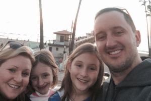 Daniel Gibney with his wife and daughters. 