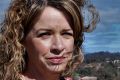 Kerrianne Abbott at the site of her new home in the Canberra suburb of Moncrieff. Ms Abbott said the delay between her ...