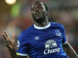 Everton's Belgian striker Romelu Lukaku celebrates scoring his team's third goal during the English Premier League football match between Sunderland and Everton at the Stadium of Light in Sunderland, north-east England on September 12, 2016. / AFP PHOTO / SCOTT HEPPELL / RESTRICTED TO EDITORIAL USE. No use with unauthorized audio, video, data, fixture lists, club/league logos or 'live' services. Online in-match use limited to 75 images, no video emulation. No use in betting, games or single club/league/player publications. /