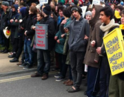 Students block police from intervening in a demonstration