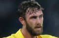 Australia's Glenn Maxwell celebrates scoring a century against Sri Lanka during their first Twenty20 cricket match in ...