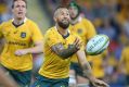 Bouncing back: Quade Cooper passes the ball against South Africa.