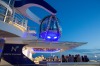 View across the pool deck at sunset on Ovation of the Seas.