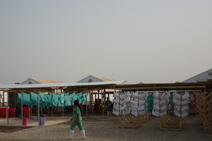 The Special Representative of the Secretary-General and Head of the United Nations Mission for Ebola Emergency Response (UNMEER), Ismail Ould Cheikh Ahmed visits Liberia and Sierra Leone, two of the countries most affected by Ebola.Surgical aprons and Wellington boots are set to dry after having been cleaned and disinfected with chlorine solution at an Ebola treatment unit (ETU) run by GOAL Global in Port Loko, Sierra Leone. Port Loko, Sierra Leone, on 8 January 2015Photo: UNMEER/Simon Ruf