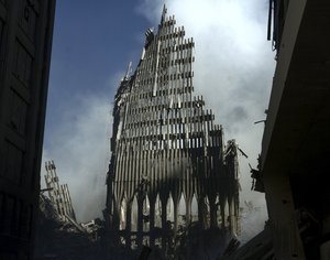 What is left of the south tower of the World Trade Center in New York City, stands like a tombstone among the debris and devastation caused by the Sep. 11, terrorist attack, September 14, 2001.