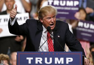 Republican presidential candidate Donald Trump finishes up speaking before a crowd of 3,500 Saturday, July 11, 2015, in Phoenix.