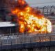 Fire engulfs the State Transit bus on the Sydney Harbour Bridge on Thursday night.
