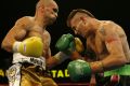 Squaring up: Green and Mundine in their 2006 showdown.