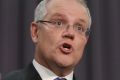 Treasurer Scott Morrison and Minister for Revenue and Financial Services Kelly O'Dwyer address the media during a press ...