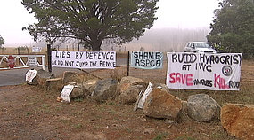 Protesters put up signs and lit a fire at the entrance to the site where the roos are being culled. 