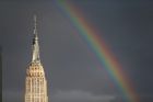 A rainbow appears over the Empire State Building in New York, Wednesday, Sept. 14, 2016. (AP Photo/Seth Wenig)