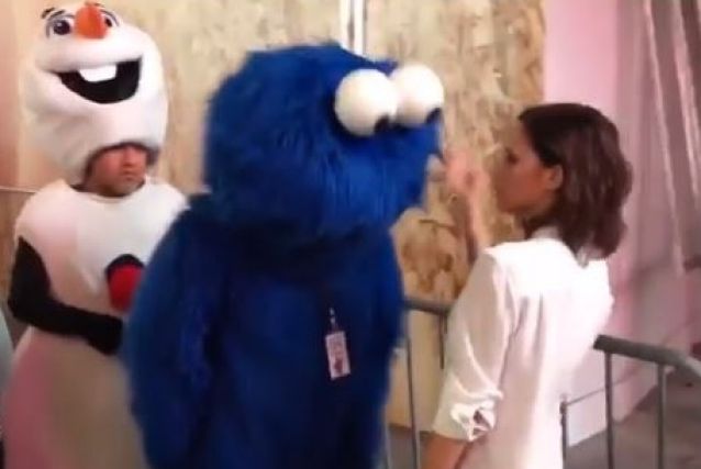 Victoria Beckham and the Cookie Monster.