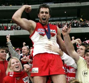 Man of the moment: Nick Davis celebrates the 2005 grand final win.