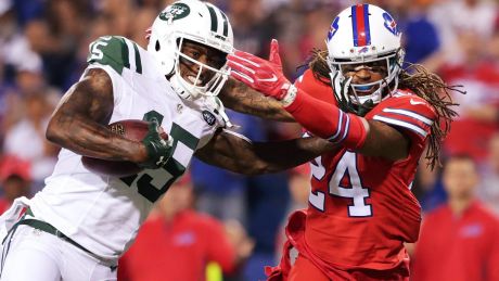 Tweet success: Brandon Marshall of the Jets is tackled by Stephon Gilmore.