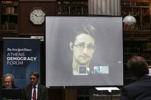 National Security Agency leaker Edward Snowden speaks via video link during the Athens Democracy Forum, organised by the New York Times, at the National Library in Athens, on Friday, Sept. 16, 2016.